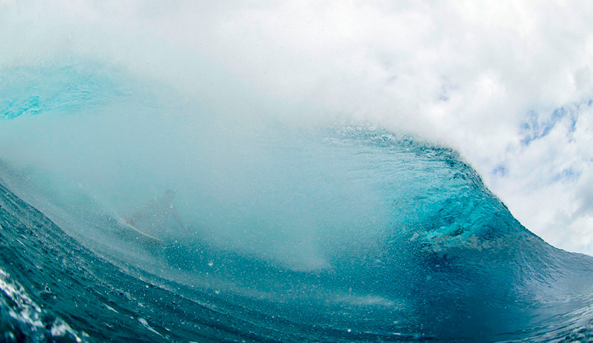 Billy Kemper getting spat on half way through a big second reef, Teahupoo bender. This is nowhere near the exit and that means Billy is going to have to negotiate the warping west bowl blind. Photo: <a href=\"http://sethderoulet.com/\" target=_blank>Seth de Roulet</a>