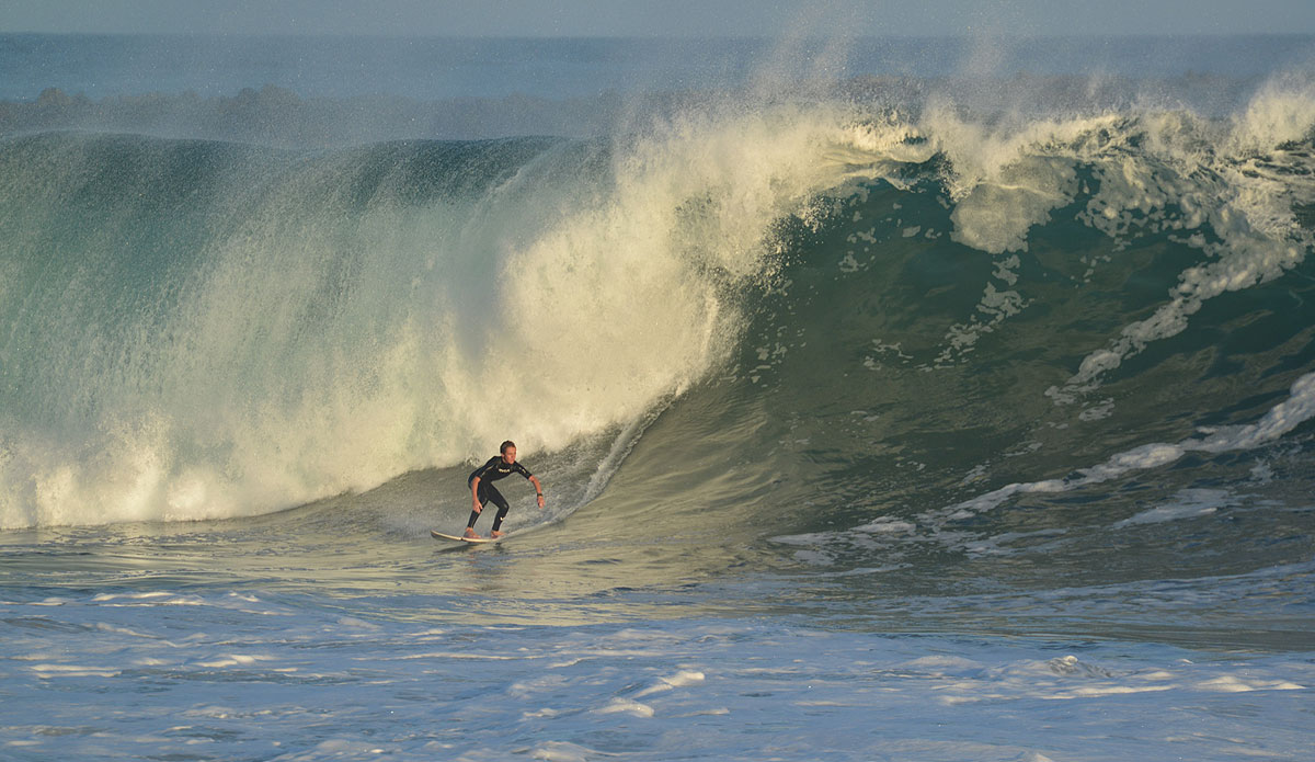 Tyler Gunter. Little ripper, big wave. Photo: <a href=\"https://www.tylerbrundage.com/\">Tyler Brundage</a>