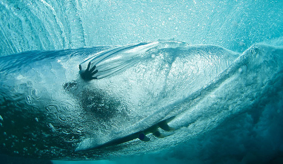 Underwater hand drag at Teahupoo. Photo: <a href=\"http://www.timmckennaphoto.com/\" target=_blank>Tim McKenna</a>.