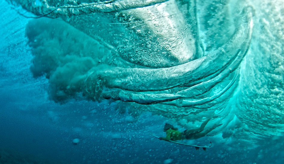 Carissa Moore duck-diving at Teavaino. Tahiti. Photo: <a href=\"https://www.timmckennaphoto.com/\" target=_blank>Tim McKenna</a>.
