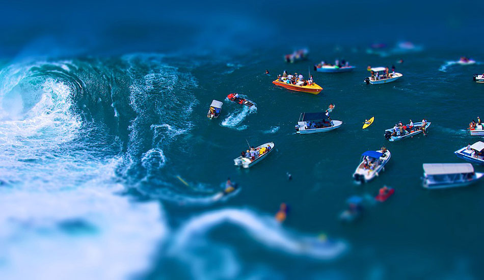  A tilted  Teahupoo channel during a big tow in swell.Photo: <a href=\"https://www.timmckennaphoto.com/\" target=_blank>Tim McKenna</a>. 