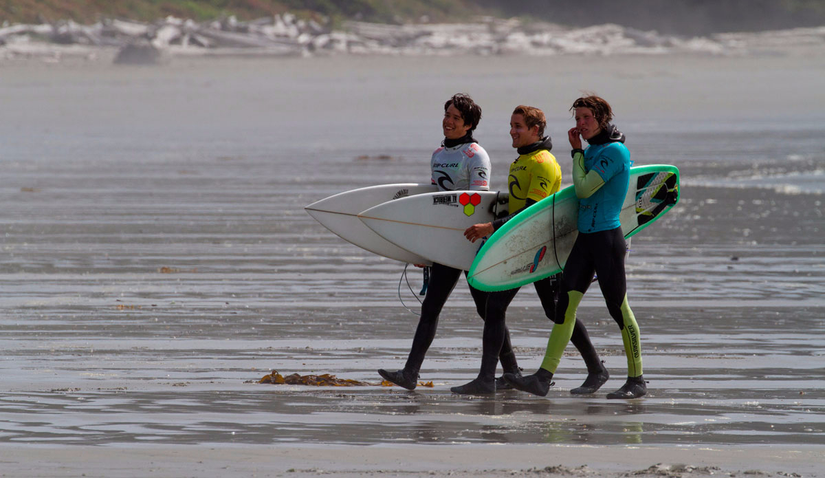 Local surfers Allister Reynolds, Marcus Paladino and Darren Lundquist celebrating their friendship after the finals. Photo: Lucas Murnaghan/<a href=\"https://surfthegreats.org/\">Surf The Greats</a>