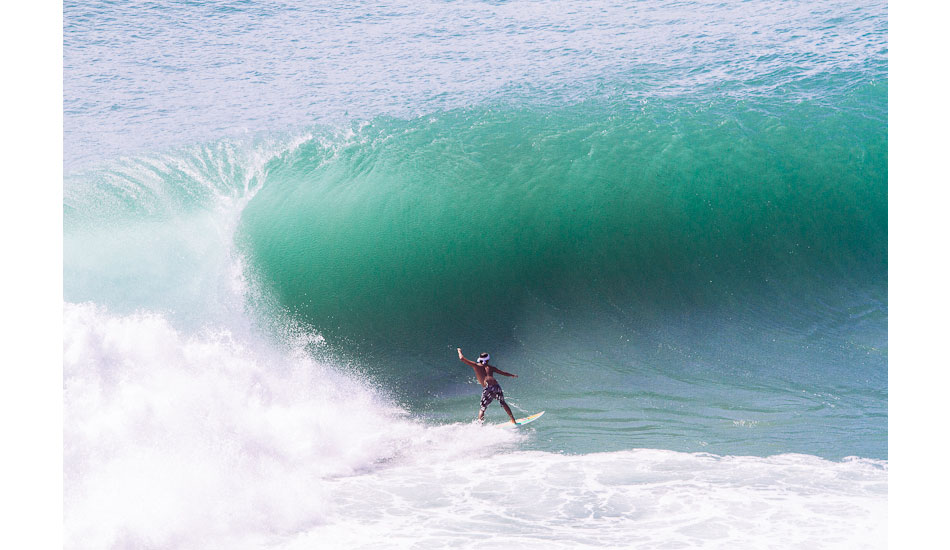 Padang Padang local about to lock in. Photo: <a href=\"https://www.teewhyphotos.com\">Tom Young</a>