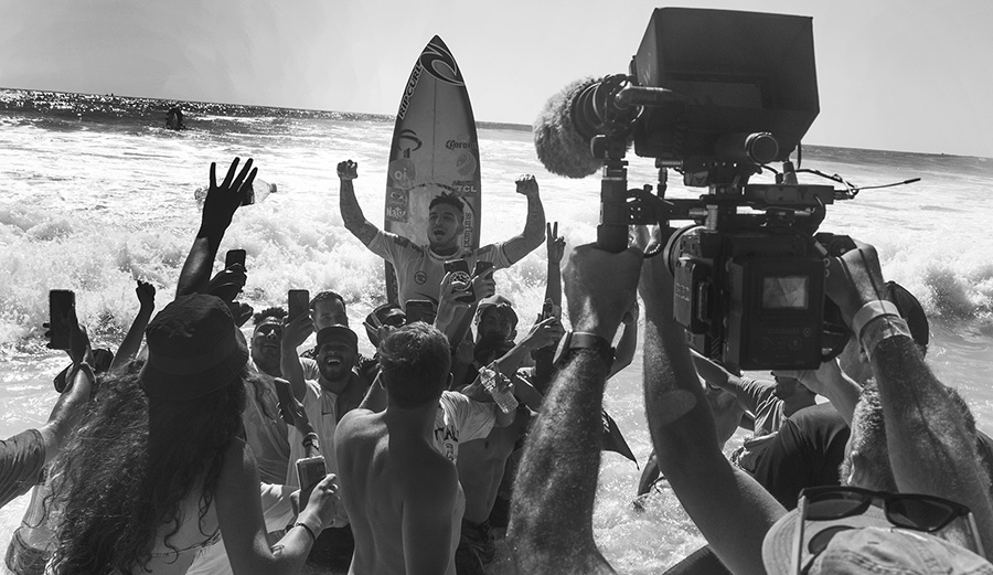 Gab\'s shoulder rides up the beach have become a thing of beauty. 