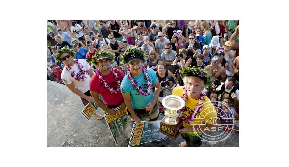 Finalists Adam Melling, Michel Bourez and Hank Gaskell stand with 2011 Vans World Cup of Surfing champ, John John Florence. Photo: <a href=\"https://www.aspworldtour.com/\" target=_blank>ASP</a>