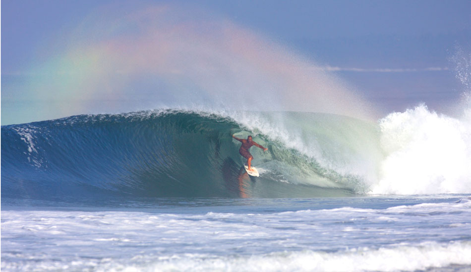 This Ventura local turned Mainland Mex cowboy enjoys a small tube under the rainbow and across the border.  Photo: <a href=\"https://tupat.posterous.com/\" target=\"_blank\">Patrick Eichstaedt</a>