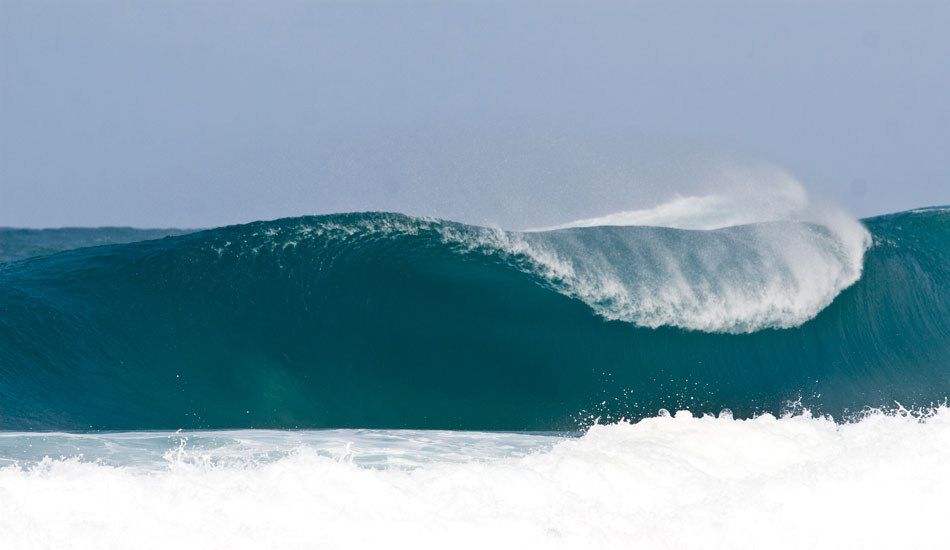  In the mid to late 90\'s, I was practically living at this beach filming the likes of Cory and Shea Lopez, Bruce and Andy Irons, Chris Ward and whoever else had the balls to drop in over this not-so talked about break. This is the trail wave at Log Cabins with no takers. Photo: <a href=\"https://tupat.posterous.com/\" target=\"_blank\">Patrick Eichstaedt</a>