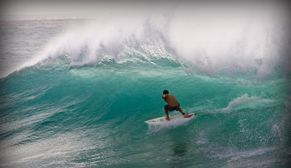 Chris has always been one of my favorite surfers to watch and shoot. This year we all were bunked up at the Beschen compound and were surfing 24/7. I remember Reno being around a bunch and giving Chris this board to ride. It was a 6\'1\'\' pintail and the rails were really foiled out. He rode this board from Sunset to Haliewa and anywhere else that was ridable. Here is Chris in the moment riding a board shaped by a revolutionary of our sport. Photo: <a href=\"https://tupat.posterous.com/\" target=\"_blank\">Patrick Eichstaedt</a>