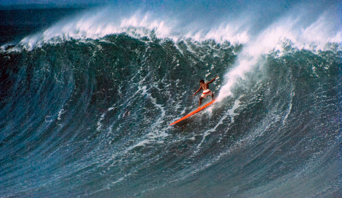 Waimea Always positioned way-behind-the-peak this mid-morning north easterly vantage of Eddie Aikau dropping into another long Waimea wall captures his hunger for challenge in the lineup, December 22, 1967. Photo: Tim McCullough