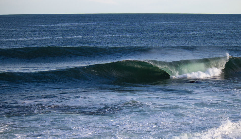 We were in Atlantic City for a buddy’s bachelor party when we saw this little blob pop up on the maps way up north. We were already six hours in the right direction so we decided to chase it. The swell wasn\'t big enough for the usual spots but we ended up scoring this insane random rock slab. Photo: <a href=\"https://thewildlyfe.com/\">Eddie Compo/TheWildLyfe</a>