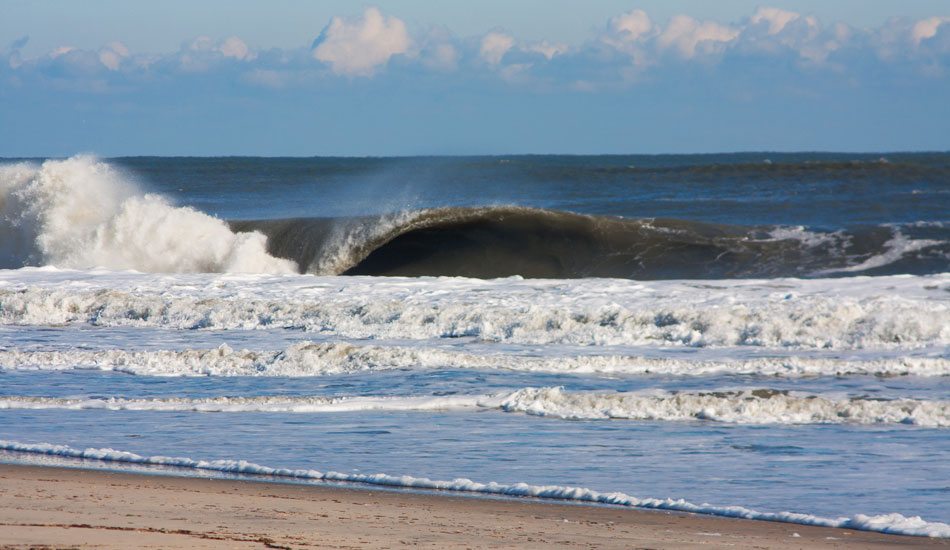 The Outer Banks is an amazing place. You can pull off and possibly find world class waves at any turn. It’s so wide open and constantly changing. This is a random north swell hitting a random sandbar on the side of the road.  Photo: <a href=\"https://thewildlyfe.com/\">Eddie Compo/TheWildLyfe</a>