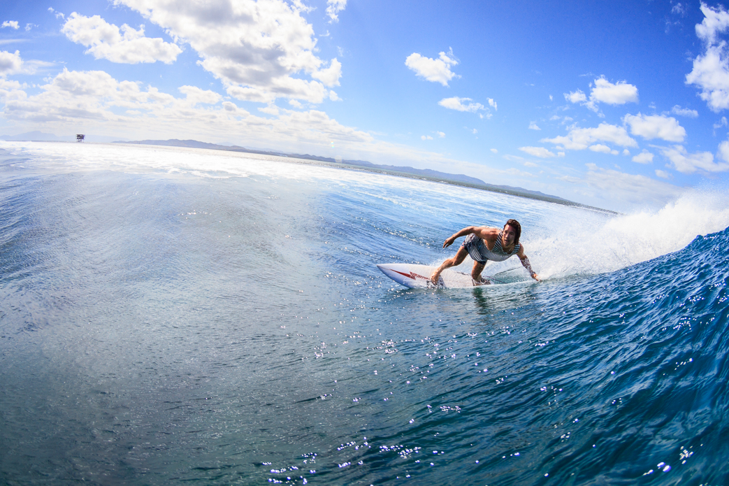 Namotu lifeguard Josh Ku slicing up the inside section.