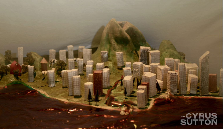 This is a still from a stop motion animation recorded in an art studio deep in San Pedro, CA. We spent days making the buildings and landscape from paper-mache and it was fun setting it all up with professional lights and making it come to life one frame at a time. Photo: <a href=\"http://www.korduroy.tv\" target=_blank>Cyrus Sutton</a>.