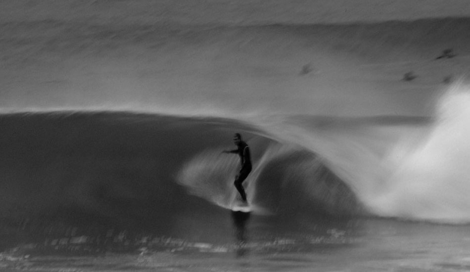 Nat on the inside of his home break. This was taken in the evening with a bit of rain. I was shooting 35mm film and the only way to get a good exposure in the darkness was to slow the shutter, stoked on the way it came out. Photo: <a href=\"https://www.korduroy.tv\" target=_blank>Cyrus Sutton</a>.