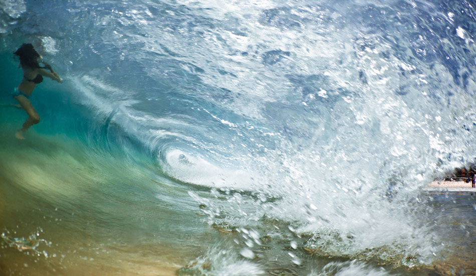 Frozen. A girl is almost frozen in the face of the breaking wave at Coogee Beach, Sydney. “This day was barely waist high. I’m super stoked on the photo though - I\'d love to say it was totally planned and choreographed, but it\'s not.\" Photo: <a href=\"https://www.marktipple.com/\" target=_blank>Mark Tipple</a>.