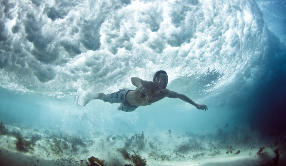Streak. A swimmer narrowly avoids the breaking wave above at Bronte Beach, Sydney. I\'ve tried to recall what happened, but I can\'t. Basically a wave came, I dove under, he dove under and I pressed the button. Turned out cool.\" Photo: <a href=\"https://www.marktipple.com/\" target=_blank>Mark Tipple</a>.