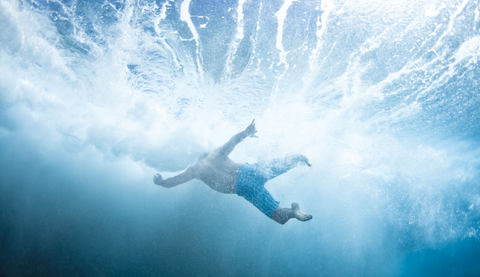 Freak. Mike Hemus backpaddles against the breaking wave as it pulls him towards shore at Elizabeth Beach, Forster, New South Wales. \"The whole East Coast was being hammered with messy, turbulent waves; the night before I had nightmares about the sediment it had stirred up. Thinking back, I wasn\'t scared of the size or the elements surrounding shooting in larger surf, just the sediment. This was taken four hours up the coast, where we had predicted it to be clear. We nailed the campaign in a mere 2 hours. Then we went surfing.\"Photo: <a href=\"https://www.marktipple.com/\" target=_blank>Mark Tipple</a>.