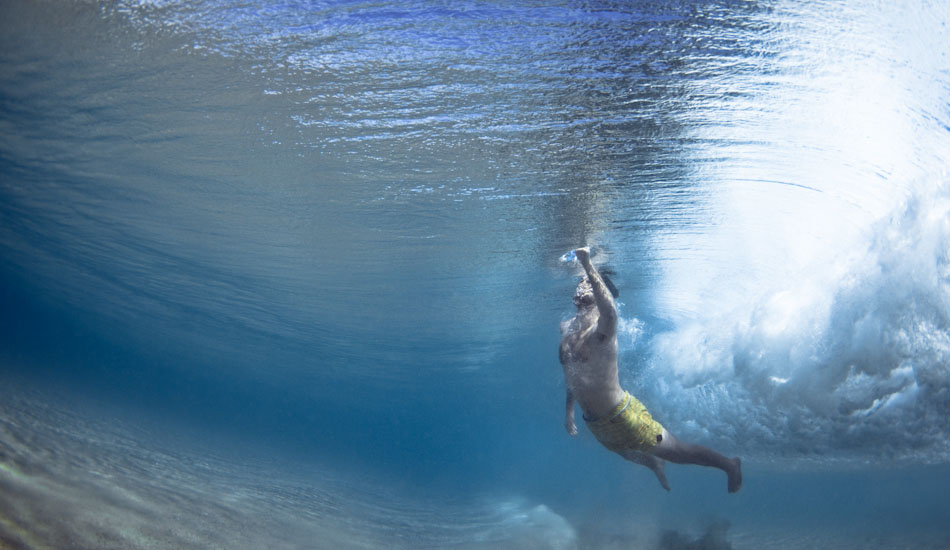 TigerFace. James Thorn punches free of the water after diving under the wave at Elizabeth Beach, Forster, New South Wales. “A huge swell day with another good friend. With water this clear and super fun playful waves, the \'shoot\' turned out to just be us mucking around.” Photo: <a href=\"https://www.marktipple.com/\" target=_blank>Mark Tipple</a>.