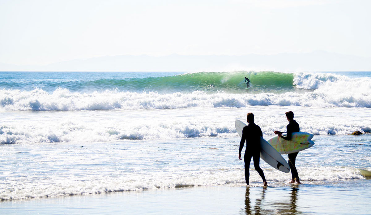 A few surfers heading out and liking what they see. Rincon, CA. Photo: <a href=\"https://www.victoriamouraphoto.com/#0\"> Victoria Smith</a>