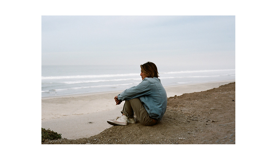 A pensive surf check. Photo: <a href=\"https://vissla.com/blog/category/kennys-bookshelf\">Kenny Hurtado</a>