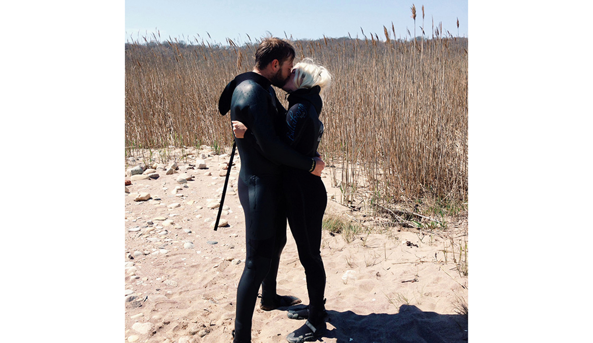 One of the best surfing couples of all time, Mikey and Lisa DeTemple, in the perfect northeast surfing-and-in-love moment. That’s some thick rubber they\'ve got going on, which makes the image even more New York. Photo: <a>@lisadetemple</a>