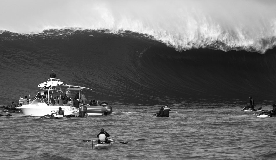 Mavericks is not a gentle wave, is it? Photo: <a href=\"https://www.adamwarmington.com/\">Adam Warmington.</a>