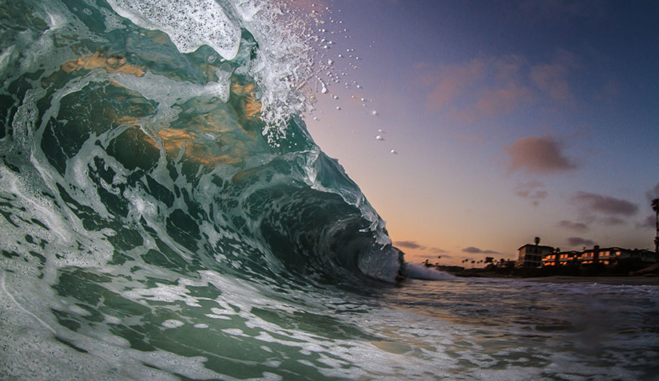Dusk Slab. While this was a thick wave, I really like how you still get the back lighting on the top of the slab. Photo: <a href=\"https://surfingeye.com/\">Ronald Hons</a>