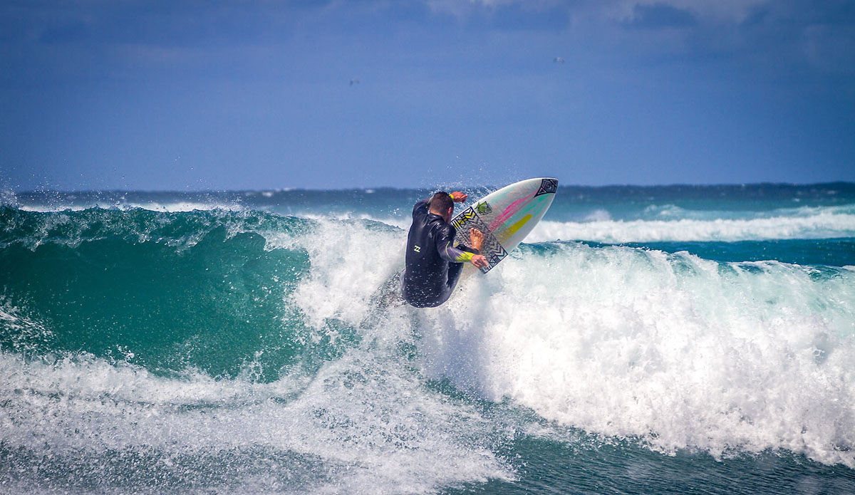Luke Goldschmidt belting a section up in the wind.  Photo: <a href=\"https://www.facebook.com/pages/Pho-Tye-Studio/398591356893177?fref=nf\"> Tyerell Jordaan</a>