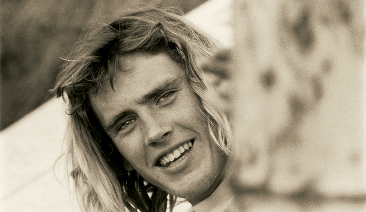 Wayne Lynch at Bells 1970
Wayne was very unhappy about the World Championships being held in Victoria in 1970, and the exposure it gave to a coastline he loved and was protective of. He seems cheerful in this picture – probably because he was abusing the photographer.
 Photo: <a href=\"https://www.johnwitzig.com.au/\">John Witzig</a>