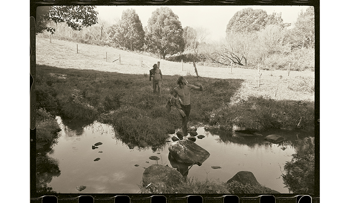 Arcadia 1969
I was trying to take pictures that said something about the times. This is Wayne Lynch and Bob McTavish at the beautifully-named Possum Creek in the hills behind Byron Bay. 
 Photo: <a href=\"https://www.johnwitzig.com.au/\">John Witzig</a>