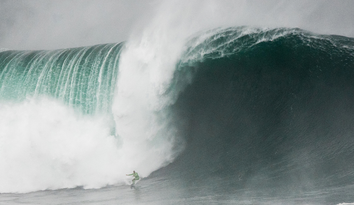 Garrett McNamara (Haleiwa, Hawaii) reaches the bottom of a massive wave at Nazaré, Portugal on November 1, 2015. The image is an entry in the TAG Heuer XXL Biggest Wave cateogry of the 2016 WSL Big Wave Awards. An El Nino weather condition is expected to cause larger waves through the coming winter season. Photo: WSL/Bruno Aleixo 