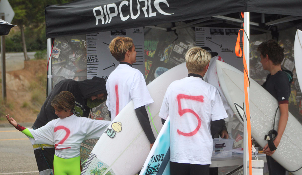 The groms checking heat times. The jerseys were as punk rock as it gets. We would like to thank Hanes tshirts, Home Depot and Ellis Spray paint for supplying them. ☺. #2 Talan was not only the smallest grom but had to deal with oversized jersey weighing him down. The little legend still made final. Photo: <a href=\"https://instagram.com/jimvandevort/\">Jim Vandevort</a>