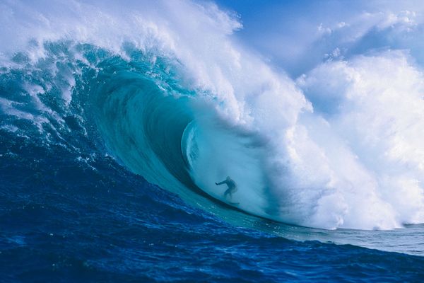 Garrett McNamara in a huge barrel at Peahi, Maui. Photo: Ron Dahlquist