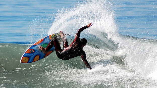 After moving to California in 1991, Roger Jeffrey attracted sponsors and began to climb the competitive ranks when Multiple Sclerosis hit. Photo: Elizabeth Jeffrey Roger Jeffrey Layback Surfer MS