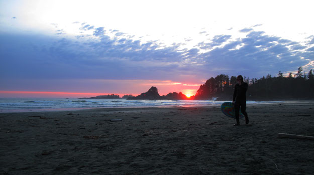 Surfer Walking Sunset Cox Bay Tofino Vancouver Island