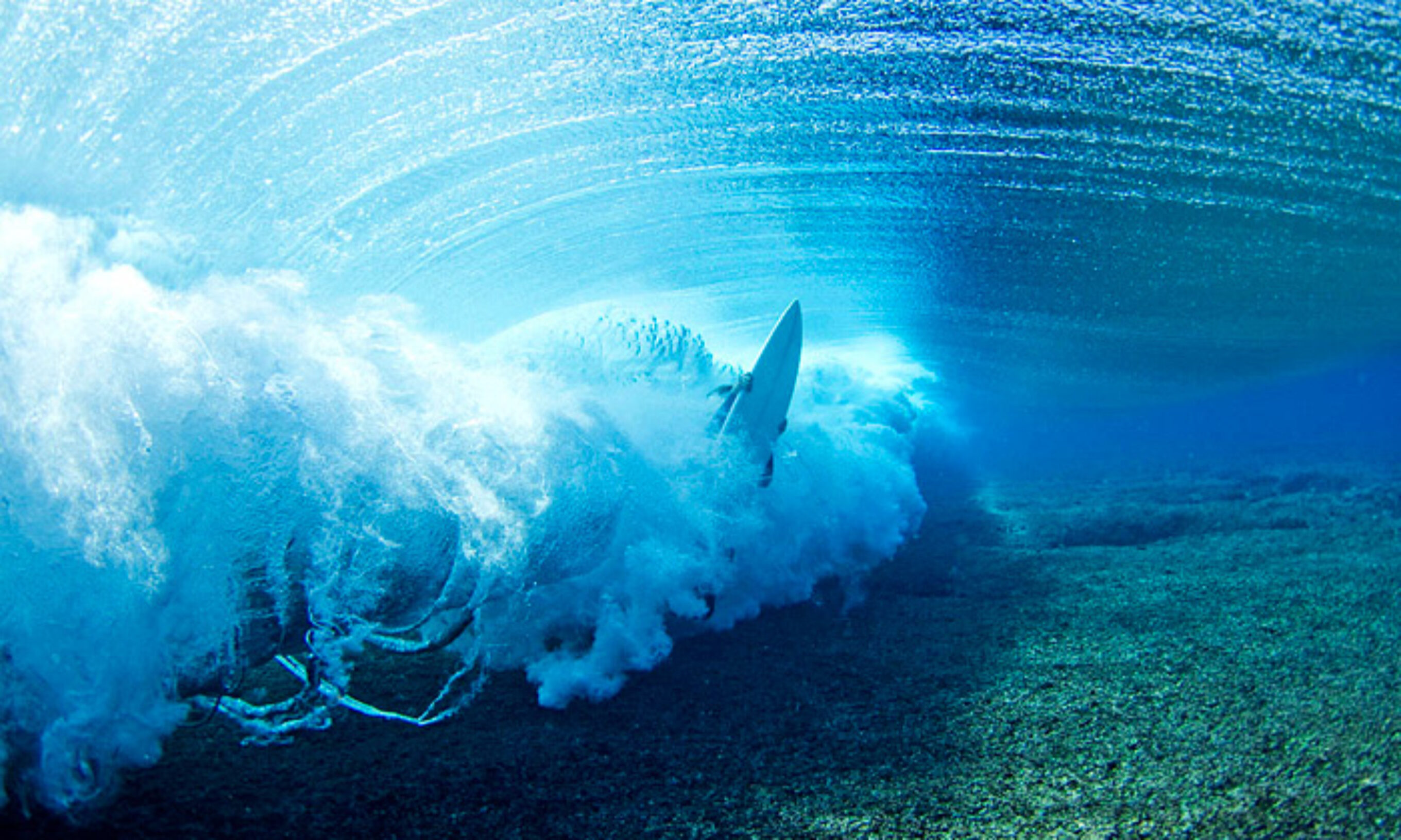 A surfers gets stoked with a mid-surf ion fix. Photo: Gibson