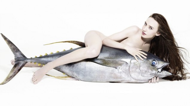 While it is a great thing that these fashionistas feel strongly enough to pose with only a haddock to preserve their modesty, how much difference is this really making to fish stocks? Image: www.fishlove.org, an OCEAN2102 project, produced by Nicholas Röhl, co-owner of Brighton Japanese restaurant Moshi Moshi, and actress Greta Scacchi, initiated in 2009 to promote 'End of the Line'". © Rankin 2012 naked models and fish