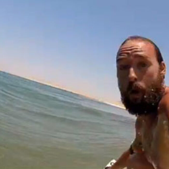 Kepa Acero is naked. He's surfing. And he's in the middle of nowhere in Angola.