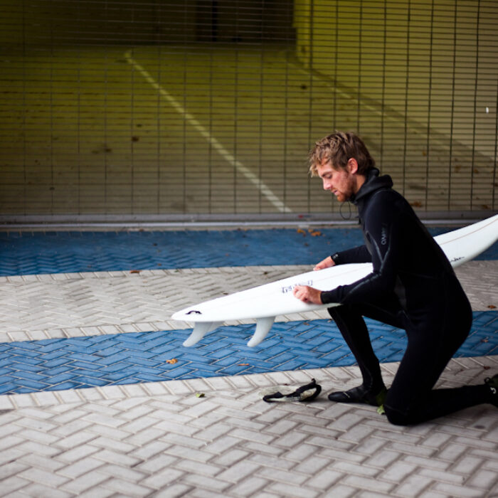 Waxing the surfboard: the grandaddy of all surf rituals. Tyler Vaughan demonstrates. Photo: Ryan Struck.