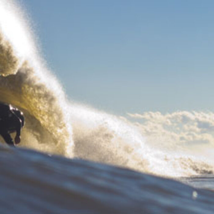 January capped off with a bang of icy swell on the East Coast, and a trip to the Outer Banks yielded a barrel full of fine waves. Cold winter's never felt so warm.