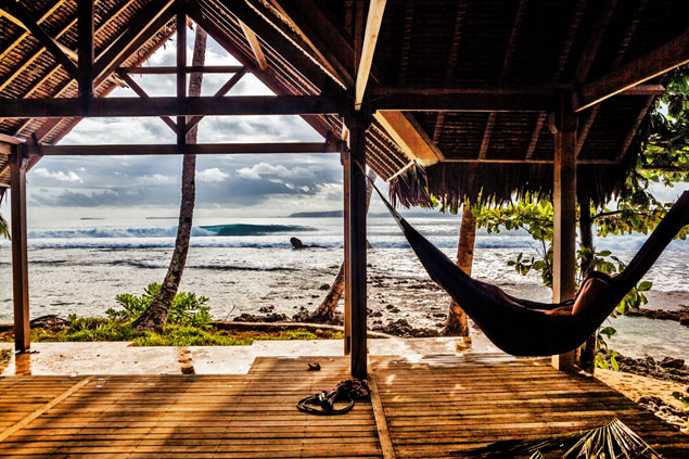 "Days Like These"-E-Bay, Indonesia. A heavy downpour that brought to life all of your senses had just passed by, the sky cracked and the sun poured through illuminating every color of Indonesia. The figure lazily takes in the perfect left after he had just finished constructing his home-made hammock. Reflections mirror back in puddles of freshly fallen rain as the humidity and sounds of deep Indonesia tattoo themselves to your mind, it's days like these... "Days Like These"-E-Bay, Indonesia. A heavy downpour that brought to life all of your senses had just passed by, the sky cracked and the sun poured through illuminating every color of Indonesia. The figure lazily takes in the perfect left after he had just finished constructing his home-made hammock. Reflections mirror back in puddles of freshly fallen rain as the humidity and sounds of deep Indonesia tattoo themselves to your mind, it's days like these...