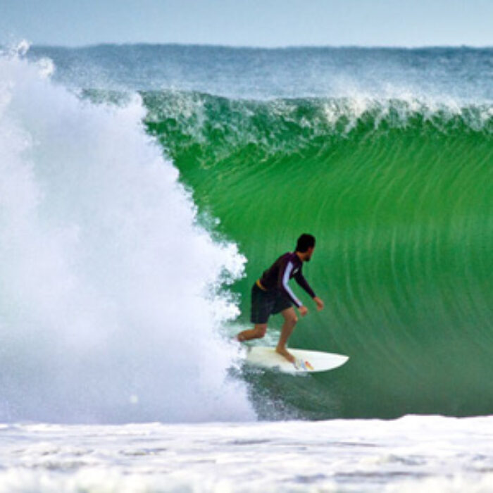Harley Ingleby sets up for a beautiful backside green barrel. Photo: Tom Woods