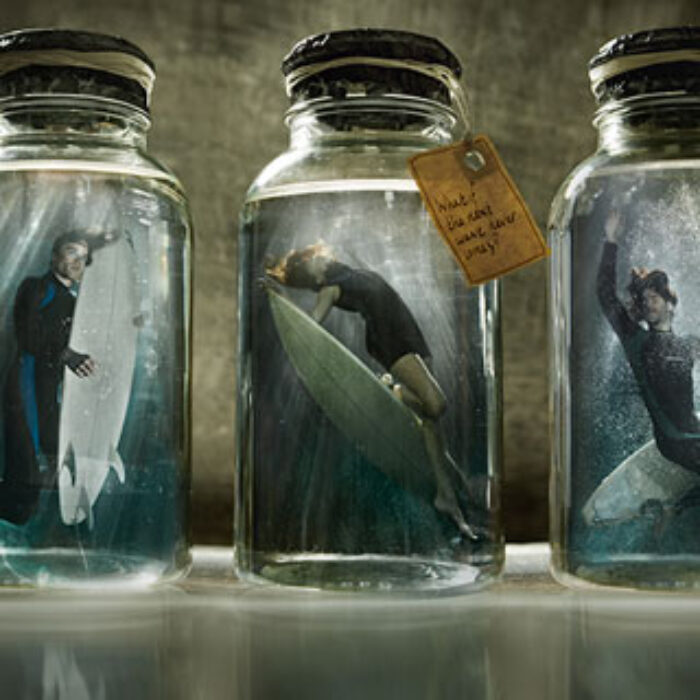 This is the final instalment of Protect Our Waves campaign images. It depicts surfers preserved in specimen jars and explores the theme of extinction, highlighting the environmental issues that currently threaten UK waves. Photo: Scott Rhea