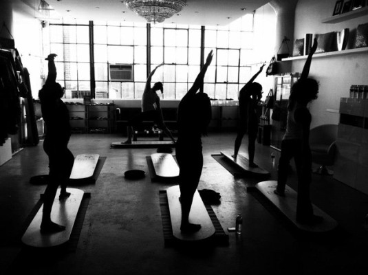 Take a break from the stressful holiday season with a nice, relaxing yoga class. Photo courtesy of Ocean Minded