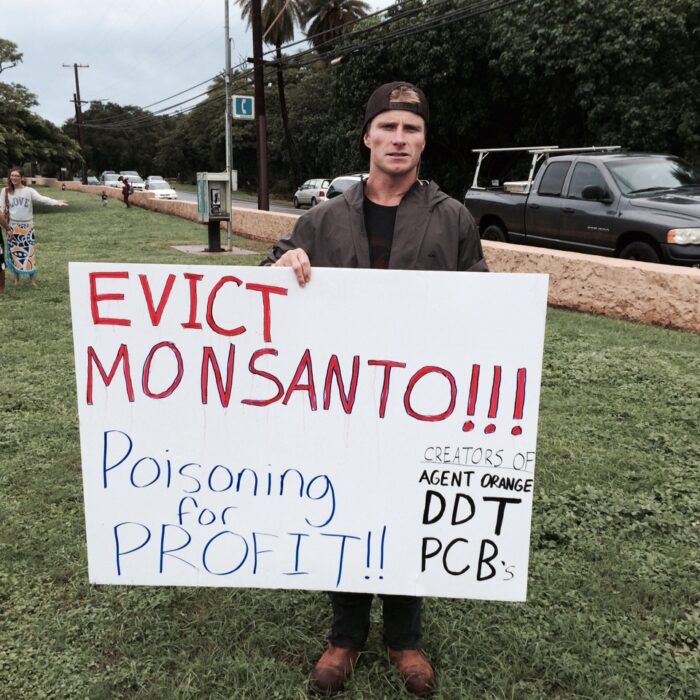 Mark Healey protests Monsanto and GMOs in Hawaii.
