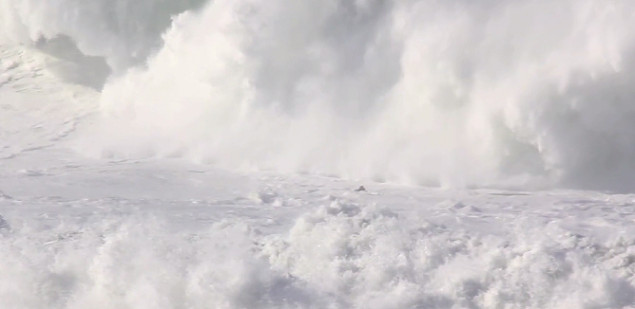 The black speck in front of the incoming surge of whitewater is Alex Martins grabbing a quick breath of oxygen.