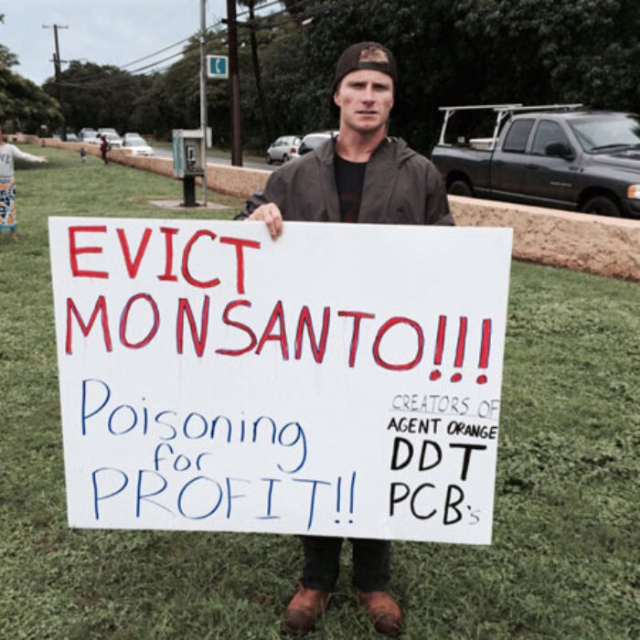 Mark Healey at a recent GMO protest in Hawaii.