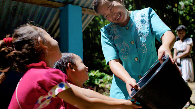 SurfAid's work internationally focuses on health, education, and emergency response. Photo: SurfAid