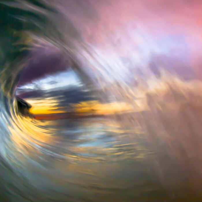 At dusk and dawn, low light on the horizon reveals movement and colors in the water than can create beautiful imagery. Waves become more abstract and open to interpretation, often resembling paintings more than photographs.