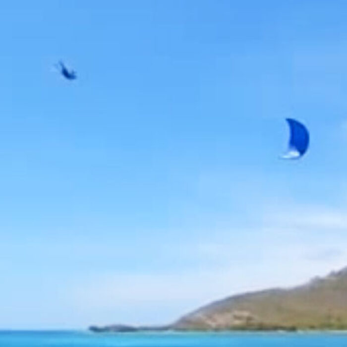 This guy manages to combine kite surfing and cliff diving in one fell swoop. He swooped, then he fell. Oh, does he ever fall.